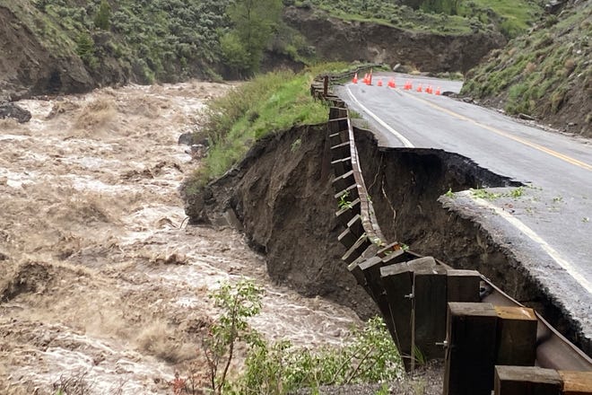 In this photo provided by the National Park Service, is high water in the Gardiner River along the North Entrance to Yellowstone National Park in Montana, that washed out part of a road on Monday, June 13, 2022.