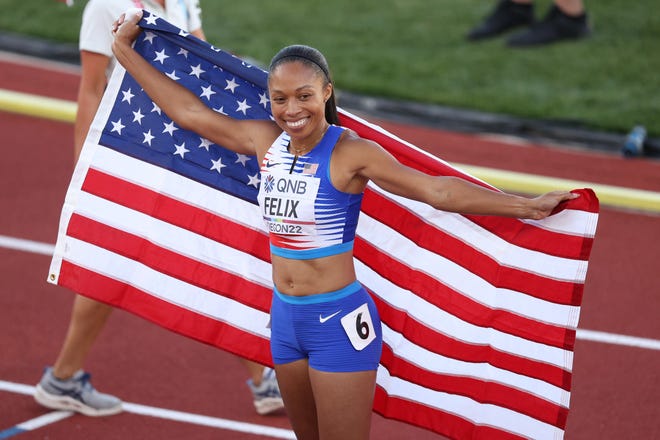 Allyson Felix celebrates her final competitive victory.