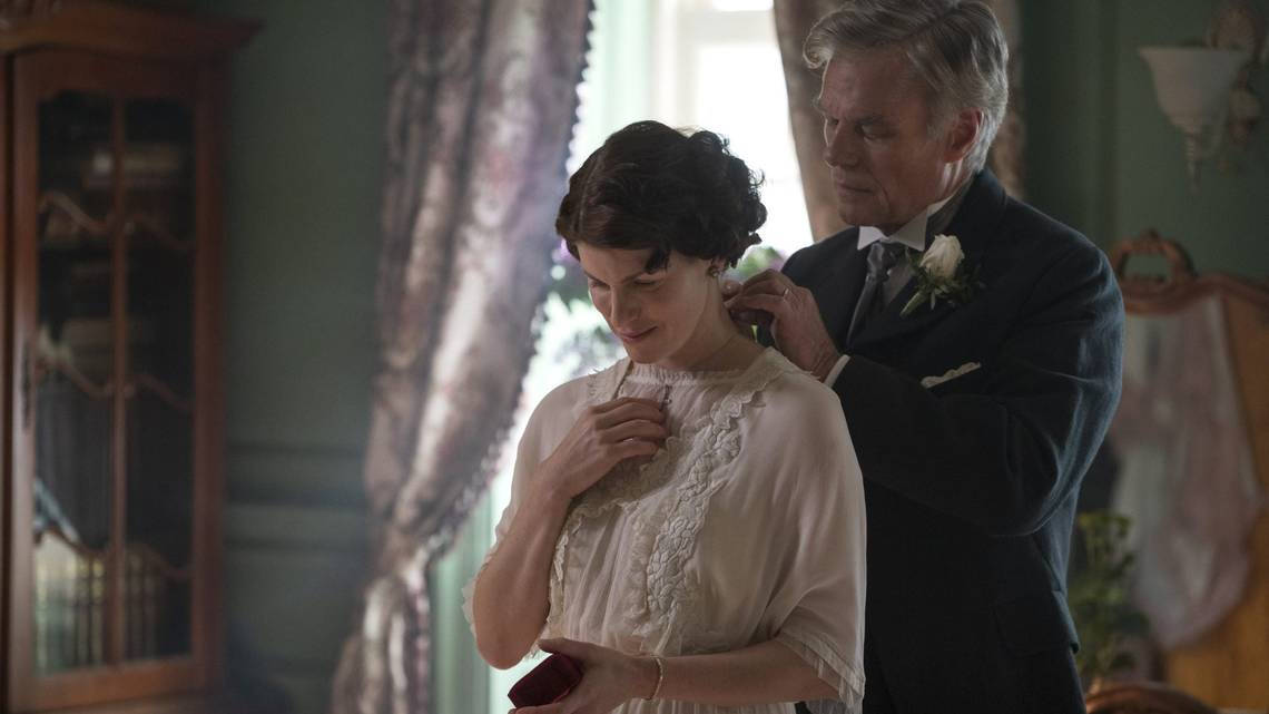 Jemima Rooper stars as Olivia Winfield Foxworth and Harry Hamlin as Mr. Winfield in the Lifetime limited series “Flowers in the Attic: The Origin.”