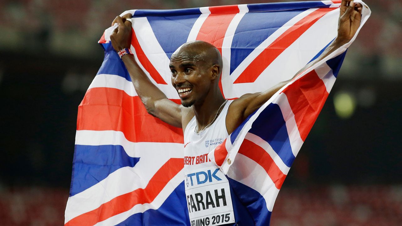 Britain's Mo Farah reacts after winning the men’s 10,000m final at the World Athletics Championships at the Bird's Nest stadium in Beijing, Saturday, Aug. 22, 2015. (AP Photo/David J. Phillip)