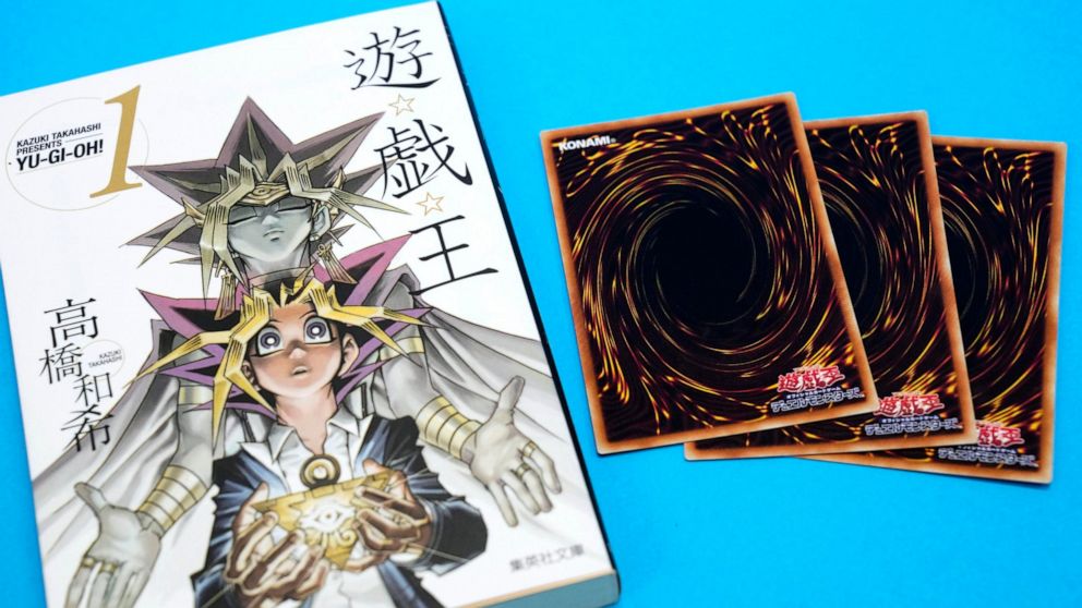 This photo shows “Yu-Gi-Oh!” manga comic and trading cards in Tokyo Thursday, July 7, 2022. Kazuki Takahashi, the creator of the “Yu-Gi-Oh!” manga comic and trading card game, has died, apparently while snorkeling in southwestern Japan, the coast gua